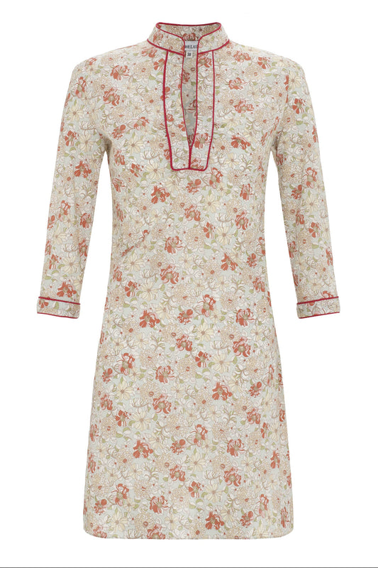Floral patterned dress with red accents on a white background