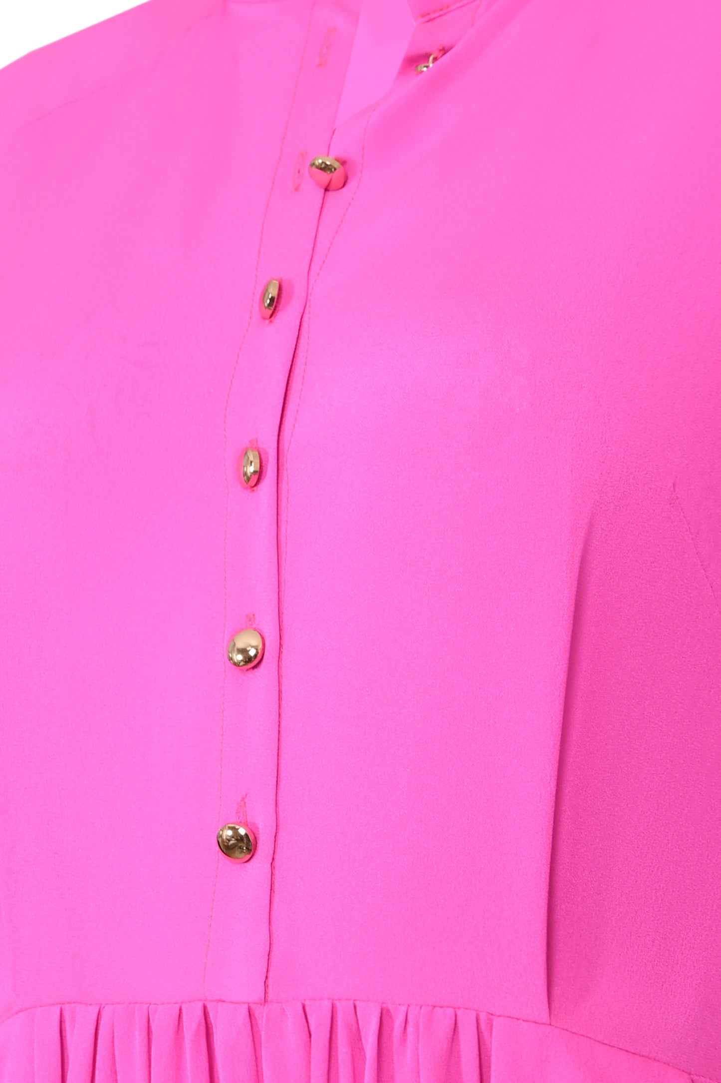 Close-up of hot pink collar lining and silk georgette fabric detail