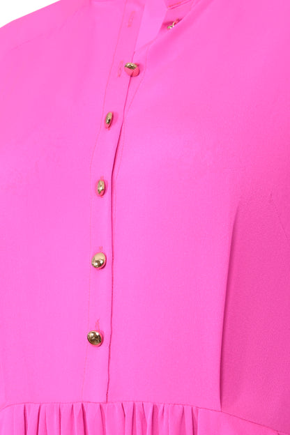 Close-up of hot pink collar lining and silk georgette fabric detail