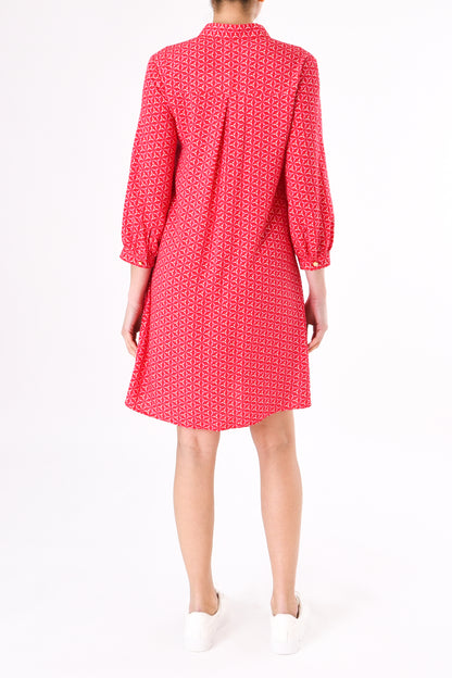 CHLOE TUNIC | RED SPINNING PRINT