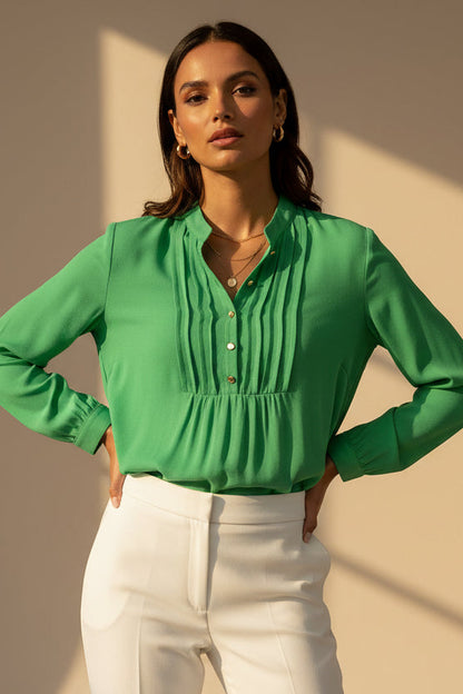 Green blouse with buttons on a white background