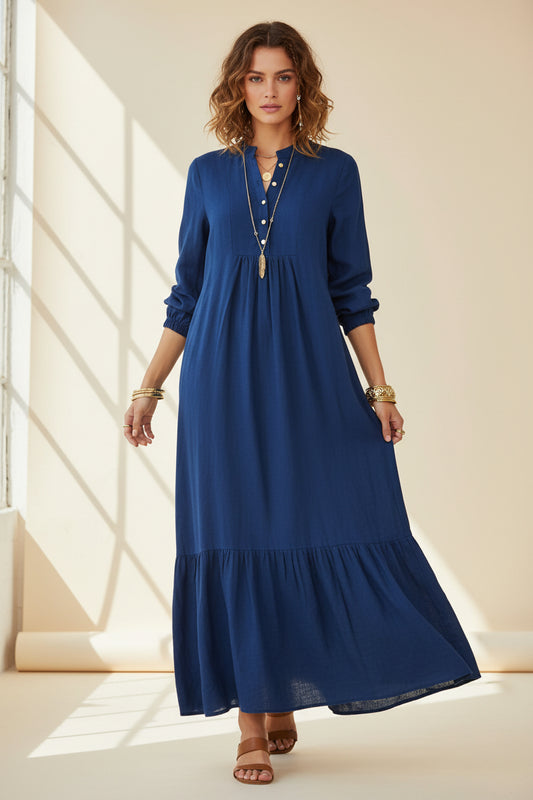 Blue dress with long sleeves on a white background