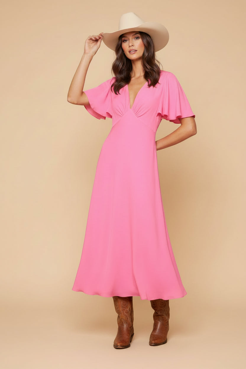 A bright pink midi-length dress with short flutter sleeves, a deep V-neckline, and a wrap-style bodice, shown against a plain white background.